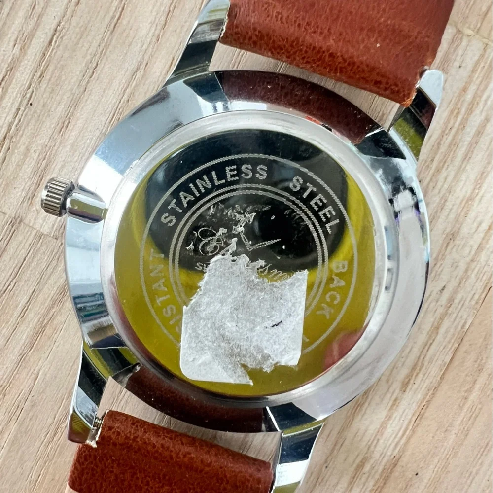 Charisma mens silver tone brown leather dress watch NEW BATTERY